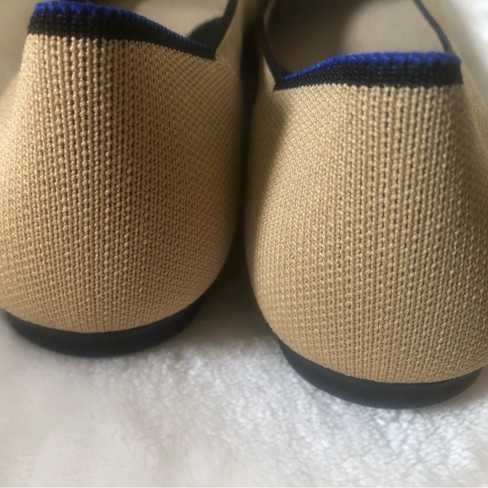 Rothy's Beige Ballet Flats with Black Trim and Bow - Picture 4 of 5